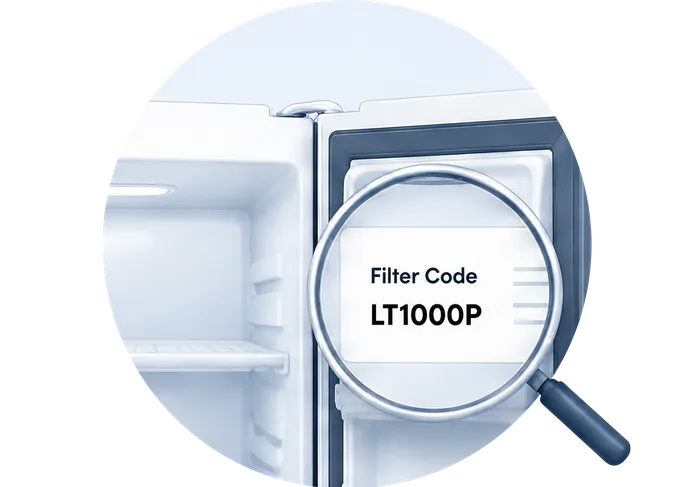Magnifier over a filter code sticker inside a refrigerator